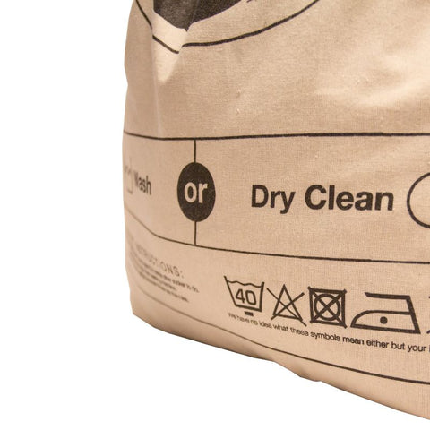 close up of the booicore laundry travel bag showing the washing instructions.