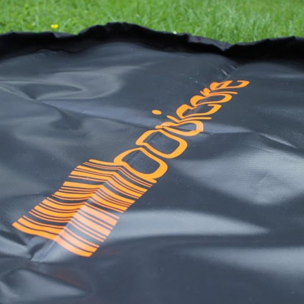 the booicore logo in bright orange on the Changing Mat, the essential mtb kit
