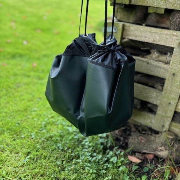 the booicore changing mat drawstring fastening showing how to use the mat after you have stood on it whilst getting changed outdoors after a ride, surf or swim