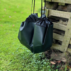 the booicore changing mat drawstring fastening showing how to use the mat after you have stood on it whilst getting changed outdoors after a ride, surf or swim