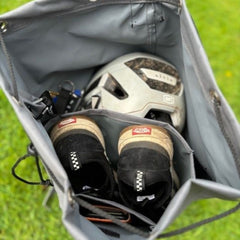 the 50l capacity of this great bag means you can pack in your mtb helmet with other clothes while you wet gear and trainers or boots are stored in the water resistant inner pocket, with your mobile separate in its own inner pocket