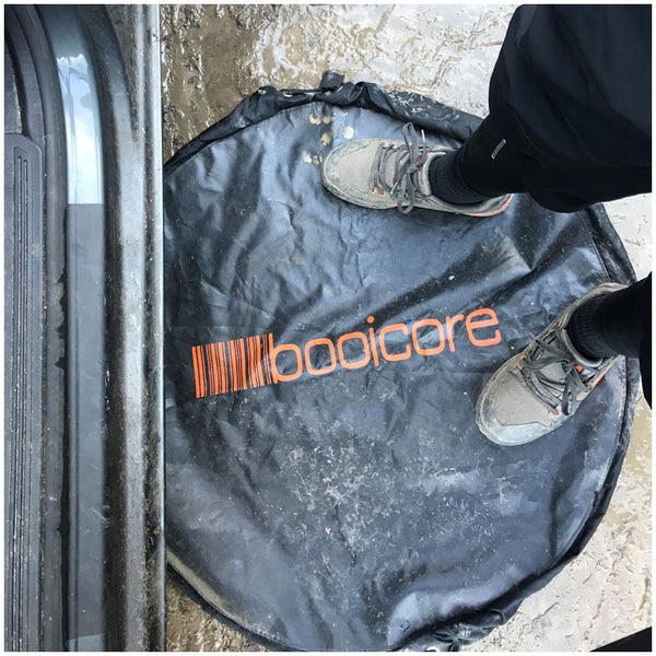 mtb life standing on booicore black changing mat in mud