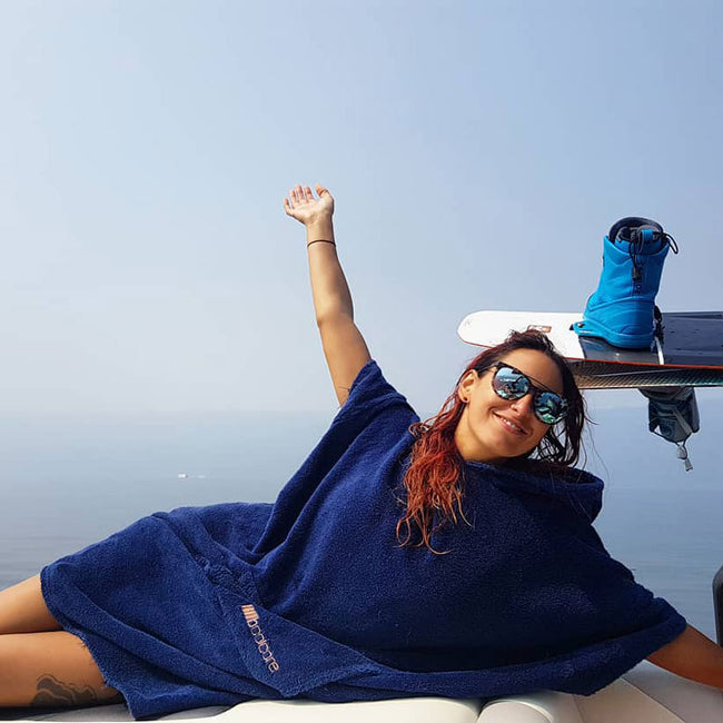 lady wearing boociore changing robe navy blue