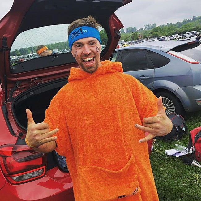 man wearing an booicore changing robe orange
