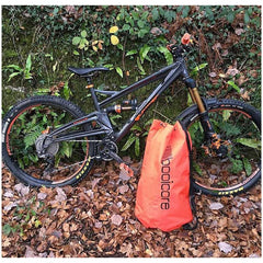 mtb mountain bike essential kit dirt bag travel orange