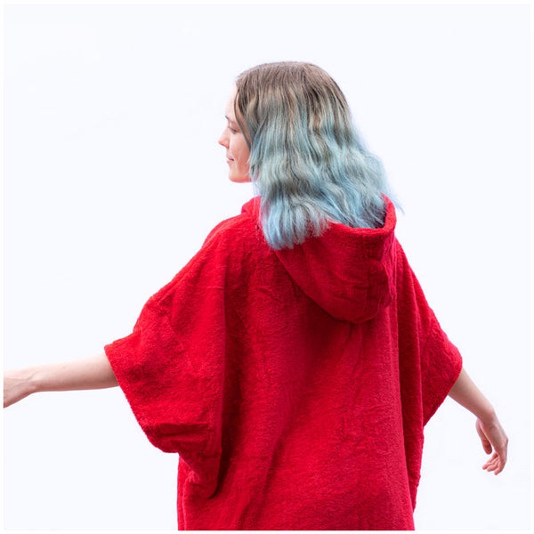 Yound woman in booicore red towel cotton robe poncho