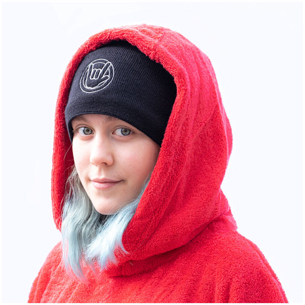 woman in booicore beanie and towel change robe warmth
