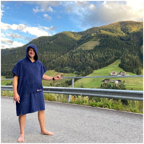 Mountain Biking Man wearing Navy Blue Cotton Towel robe after riding