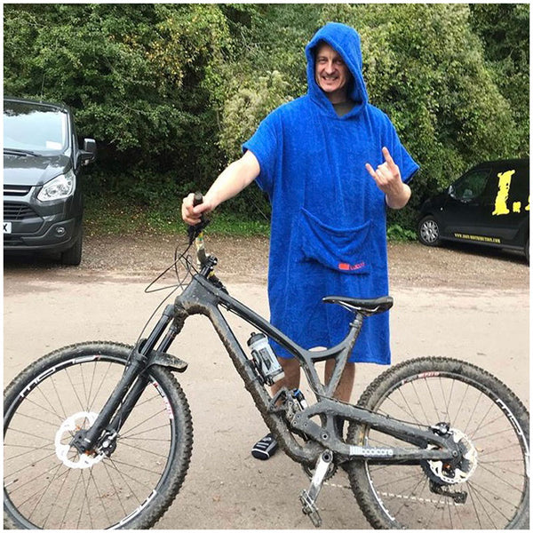 man wearing booicore short sleeve hooded cotton towel robe after mountain biking