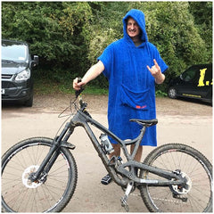 man wearing booicore short sleeve hooded cotton towel robe after mountain biking