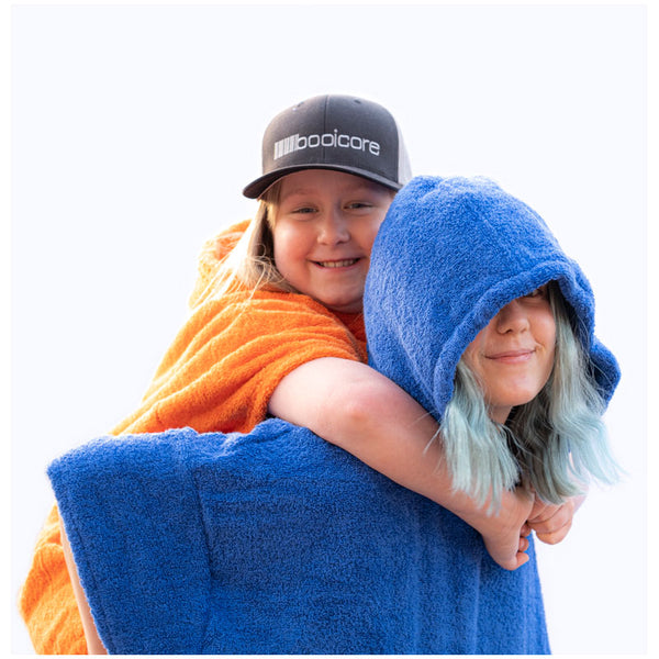 2 woman having fun in booicore towel robes